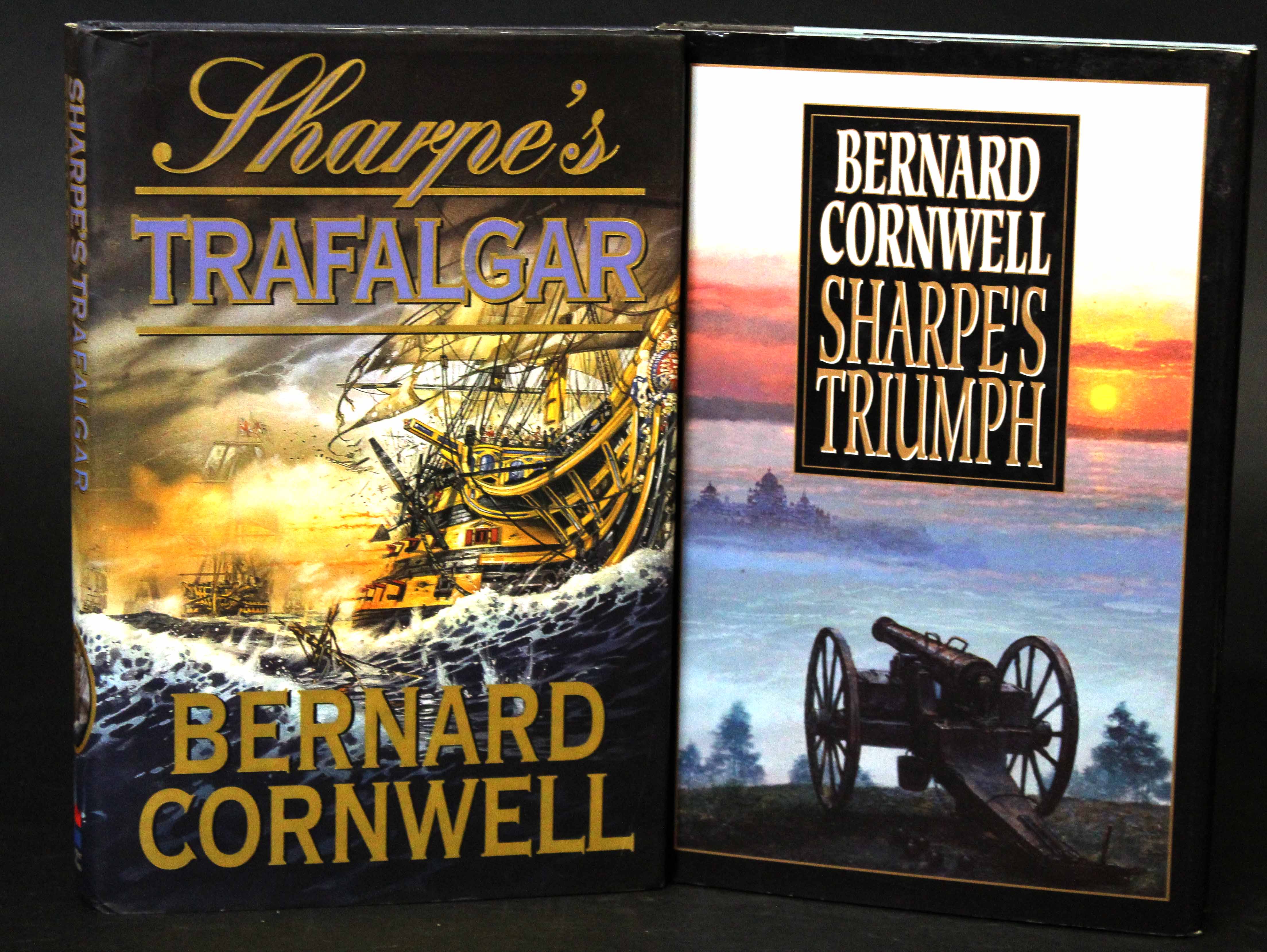 BERNARD CORNWELL: 2 titles: SHARPE'S TRIUMPH, New York [1999], 1st edition, signed, original cloth