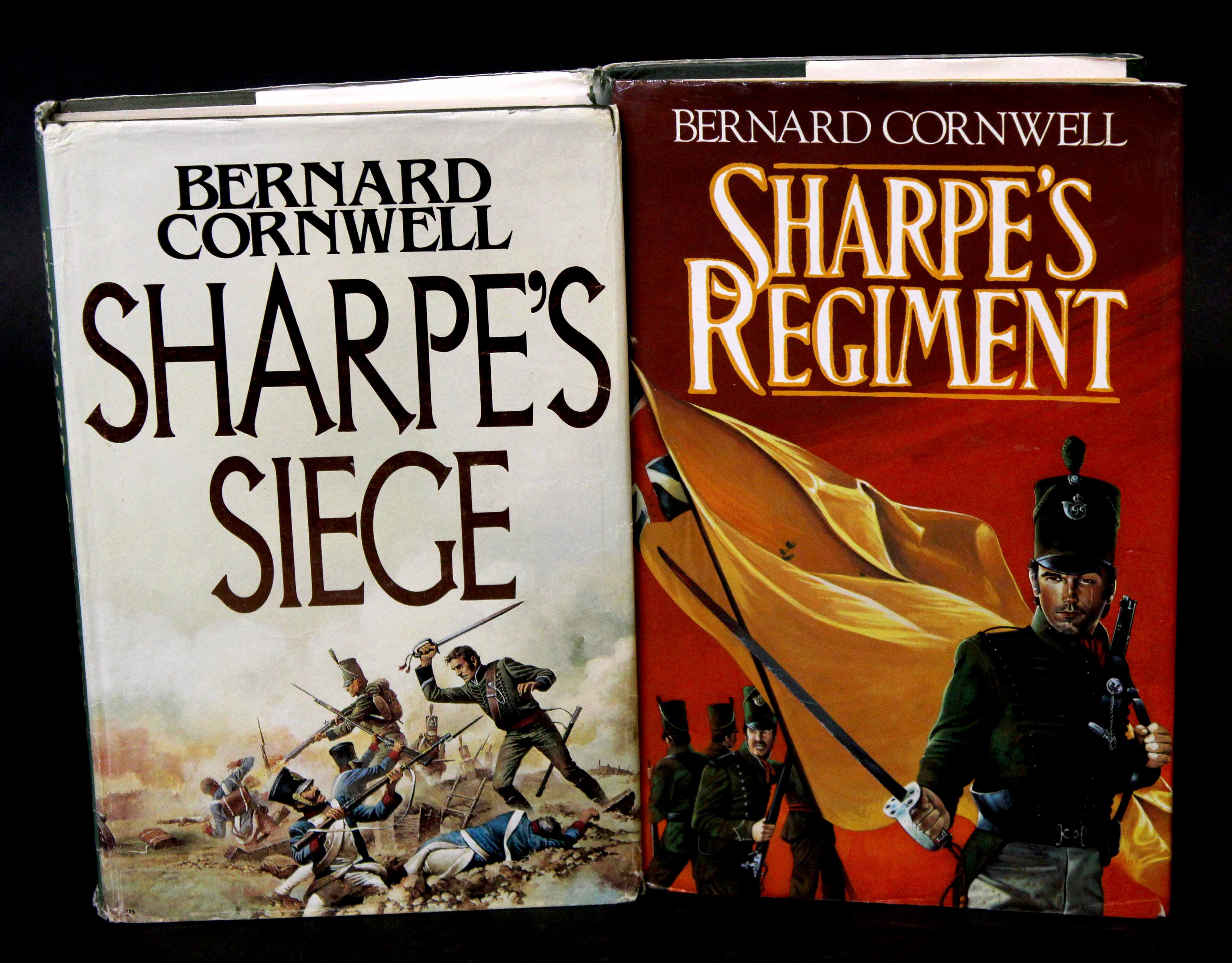 BERNARD CORNWELL: 2 titles: SHARPE'S REGIMENT, London, Collins, 1986, 1st edition, signed,