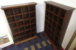 Two stained wood display units split into small square sections, each unit 98cm high (2)