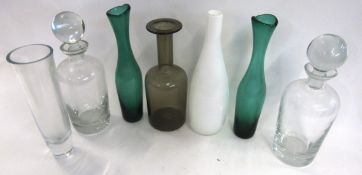 Collection of glass wares including mallet shaped decanter and two further decanters with