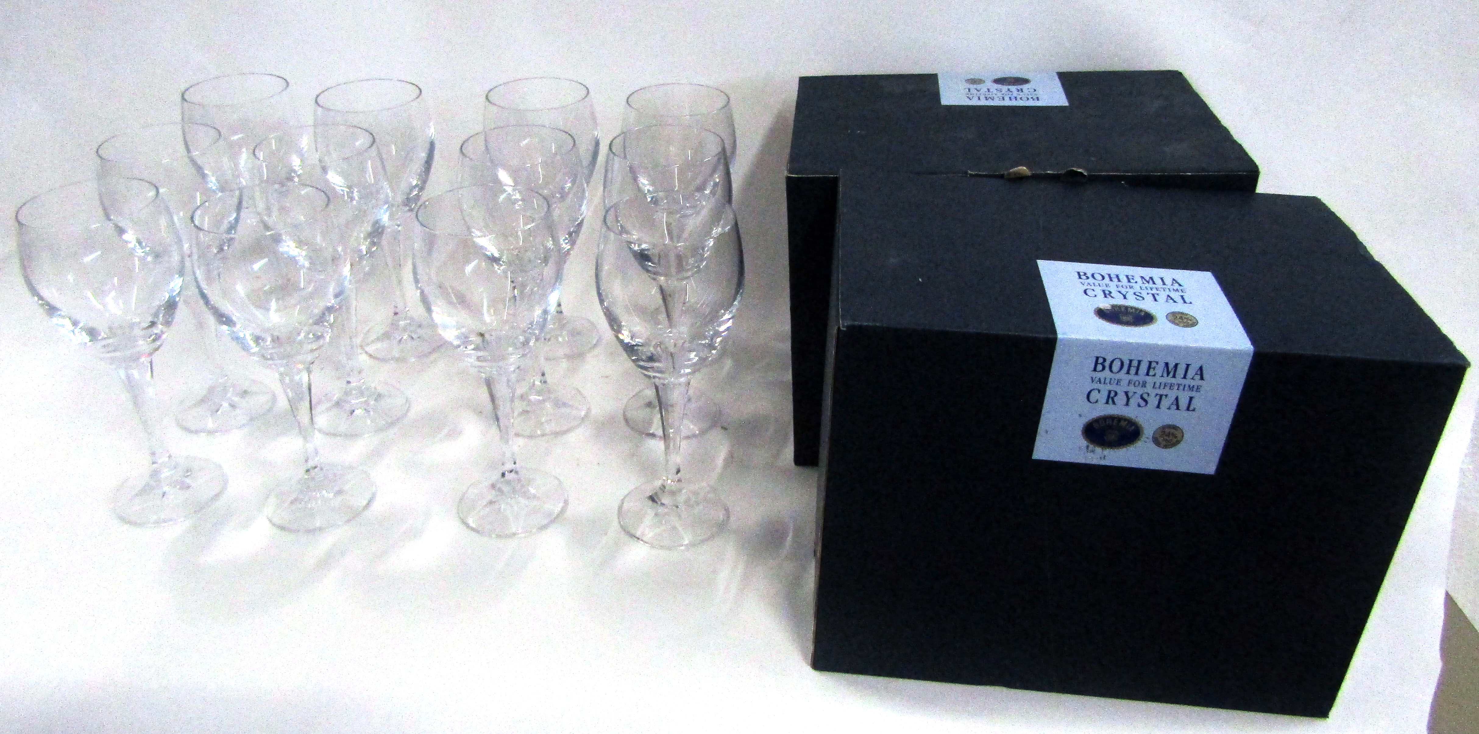 Set of twelve Bohemia Crystal modern tall stemmed wine glasses with original boxes, 24cm high
