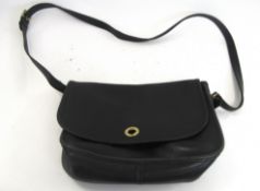 Ladies black patent leather handbag by Coach, ref no J10-9790