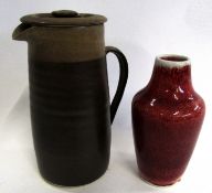 Cobridge stoneware red glazed vase with factory mark to base, together with a Studio Pottery jug and