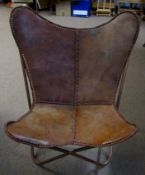Late 20th century leather and copper "butterfly" chair, 76cm wide