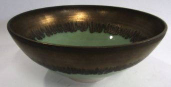 Bill Moore (born 1969) Studio Pottery bowl with a brown streaked design with a green glazed