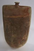 Peter Hayes (born 1946) Ragu vase of flattened form with an incised design and artist's stamp to