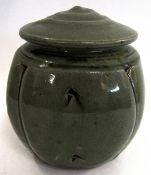 John Jelfs (b 1946) Studio Pottery bowl and cover, the lobed body with a grey green incised