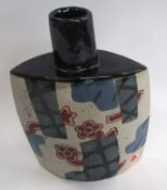 John Maltby (born 1936) Spade shaped Studio ceramic vase with a geometric design in red and blue