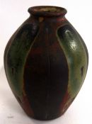 John Jelfs (b 1946) Small Studio Pottery baluster vase with a green and red streaked design, stamped