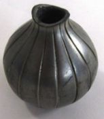 Small shaped metal vase, the base impressed "Just Denmark 2601", 5cm high