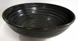 Large Studio Pottery bowl of ribbed form with a grey green design, artist's monogram to base, 26cm