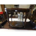 EDWARDIAN MAHOGANY AND INLAID TWO HANDLED TRAY ON STAND WITH SMALL BRASS CASTERS TOGETHER WITH A