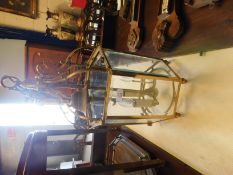 BRASS FRAMED SIX-GLASS HANGING LANTERN