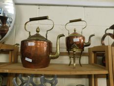 BRASS AND COPPER KETTLE TOGETHER WITH A FURTHER KETTLE ON STAND (2)