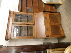 ARTS & CRAFTS OAK FRAMED BUREAU BOOKCASE WITH INLAID DETAIL, THE TOP FITTED WITH TWO LEADED AND