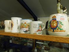 FOUR ROYAL COMMEMORATIVE MUGS TOGETHER WITH A FURTHER NURSERY MUG (5)