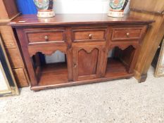 EASTERN HARDWOOD DRESSER BASE WITH THREE DRAWERS WITH CENTRAL CUPBOARD DOOR FLANKED EITHER SIDE BY