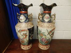 PAIR OF MODERN LARGE ORIENTAL VASES WITH SHAPED HANDLES AND FLARED NECKS WITH DECORATIVE SCENES