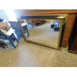 DECORATIVE RECTANGULAR EBONISED AND GILT RECTANGULAR WALL MIRROR