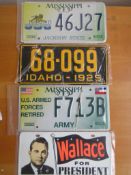 Four assorted decorative metal American Car Number Plates