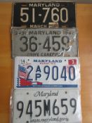 Four assorted decorative metal American Car Number Plates