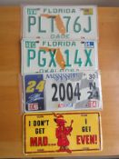 Four assorted decorative metal American Car Number Plates