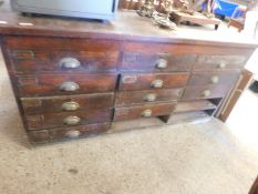 GOOD QUALITY OAK FRAMED HABERDASHERY OR SHOP CABINET FITTED WITH FIFTEEN DRAWERS (3 MISSING) WITH