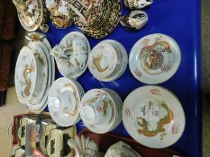 QUANTITY OF DINNER AND COFFEE WARES WITH GILT DECORATION DEPICTING A STYLISED DRAGON DESIGN