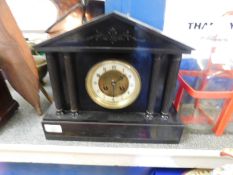 BLACK SLATE MANTLE CLOCK WITH ENAMEL DIAL AND COLUM SUPPORTS