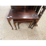 SET OF THREE BEECHWOOD NESTING TABLES WITH CARVED FLORAL TOPS