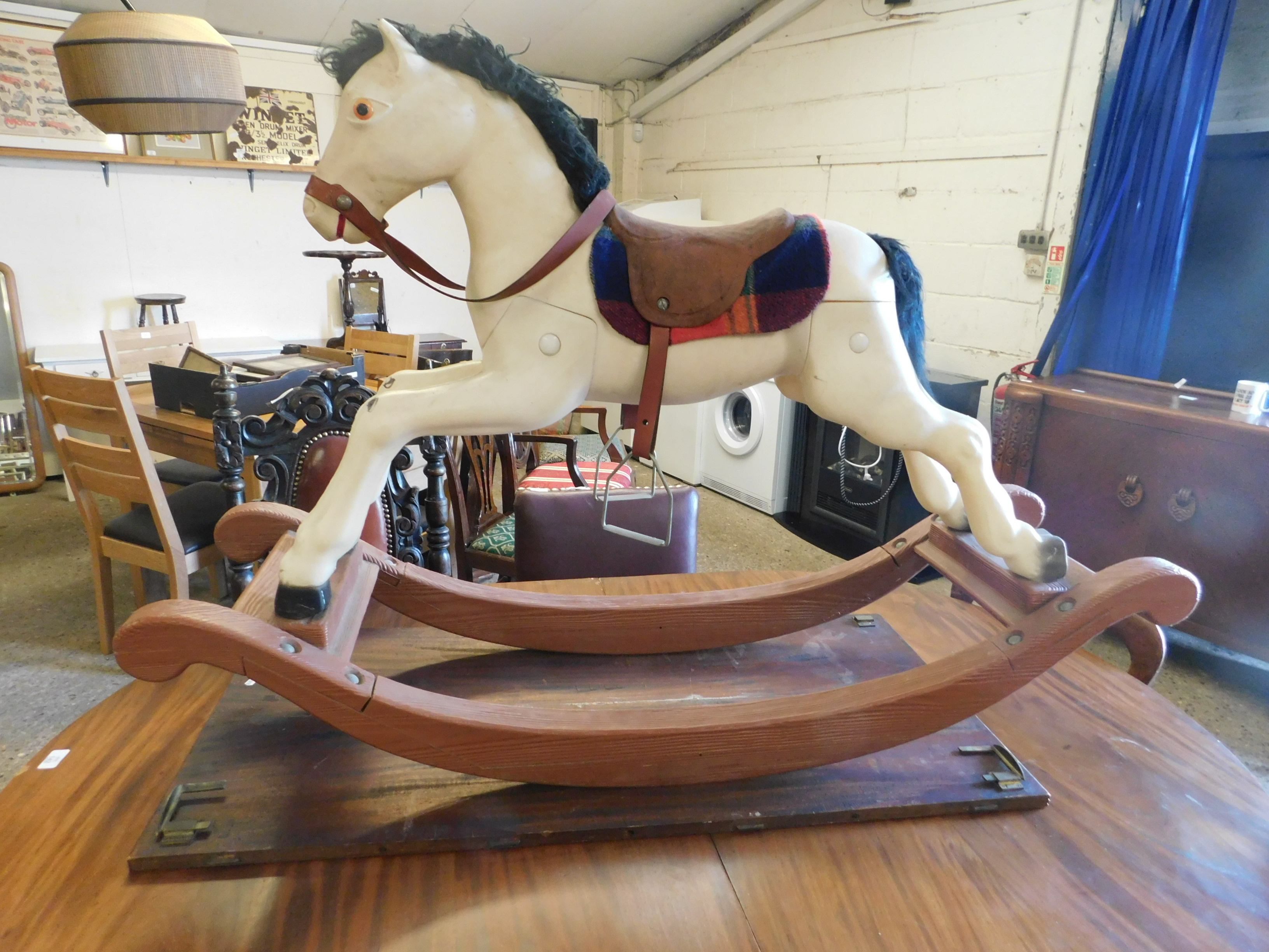 WHITE PLASTIC FORMED CHILDS ROCKING HORSE