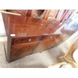 REPRODUCTION MAHOGANY SIDEBOARD FITTED WITH FOUR DRAWERS OVER FOUR CUPBOARD DOORS WITH RINGLET