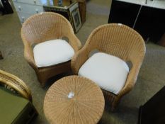 PAIR OF WICKER FORMED ARMCHAIRS WITH WHITE UPHOLSTERED CUSHION AND CIRCULAR SIDE TABLE (3)