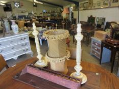 PAIR OF WHITE PAINTED REEDED COLUMN LAMPS AND A FURTHER WALL MOUNTED SHELF