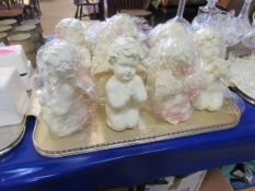 TRAY OF EIGHT RESIN PUTTI ORNAMENTS