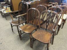 ELM HARD SEATED STICK BACK WHEEL BACK ARMCHAIR TOGETHER WITH A SET OF FOUR DINING CHAIRS (5)