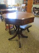 SMALL PROPORTIONED MAHOGANY OCTAGONAL LEATHER TOP DRUM TABLE ON A QUATREFOIL BASE