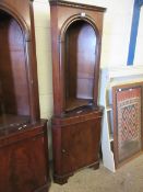 REPRODUCTION MAHOGANY CORNER CABINET WITH ARCHED TOP AND OPEN SHELVES OVER PANELLED DOOR
