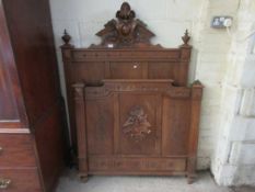 GOOD QUALITY FRENCH WALNUT SINGLE BED WITH HEAVILY CARVED TOP AND URN FINIALS WITH PANELLED DETAIL