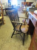 EARLY 19TH CENTURY ELM HARD SEATED STICK BACK ARMCHAIR WITH AN X FRAMED STRETCHER AND TURNED