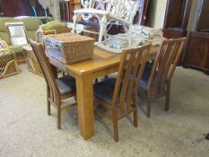 GOOD QUALITY MODERN OAK FRAMED EXTENDING DINING TABLE ON HEAVY SQUARE LEGS TOGETHER WITH A SET OF