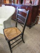 EDWARDIAN MAHOGANY AND INLAID BEDROOM CHAIR WITH CANE SEAT