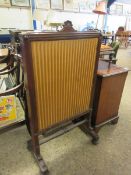 WILLIAM IV MAHOGANY FIRE SCREEN WITH LIFT UP TOP AND EMBROIDERED PANEL ON A SPLAYED CARVED BASE