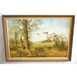 AR Brian C Day (Born 1934), Pheasant in Flight over Woodland, oil on canvas, signed lower right,