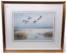 AR Roland Green (1896-1972) Mallard in Flight over an Estuary, watercolour, signed lower left,