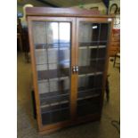 MID 20TH CENTURY OAK FRAMED BOOK CASE WITH TWO LEADED AND GLAZED DOORS