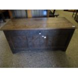 18TH CENTURY OAK COFFER WITH THREE PANELLED CARVED FRONT AND PLANK TOP