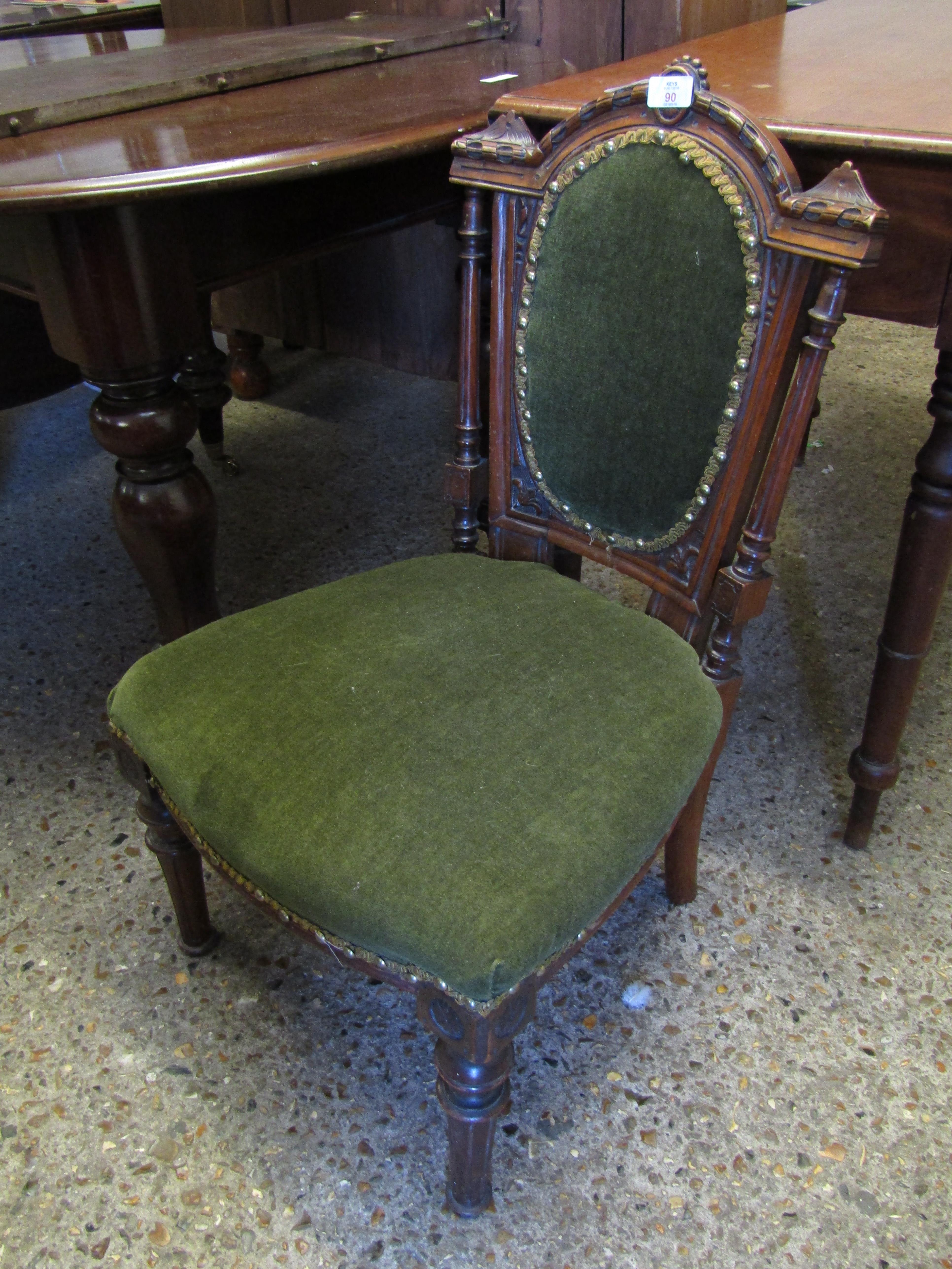 VICTORIAN NURSING CHAIR, GREEN UPHOLSTERED BACK AND SEAT, ARCHED TOP WITH CARVED DETAIL, FLANKED