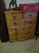 STAINED PINE FRAMED CHEST OF TWO OVER FOUR FULL WIDTH DRAWERS AND TURNED KNOB HANDLES