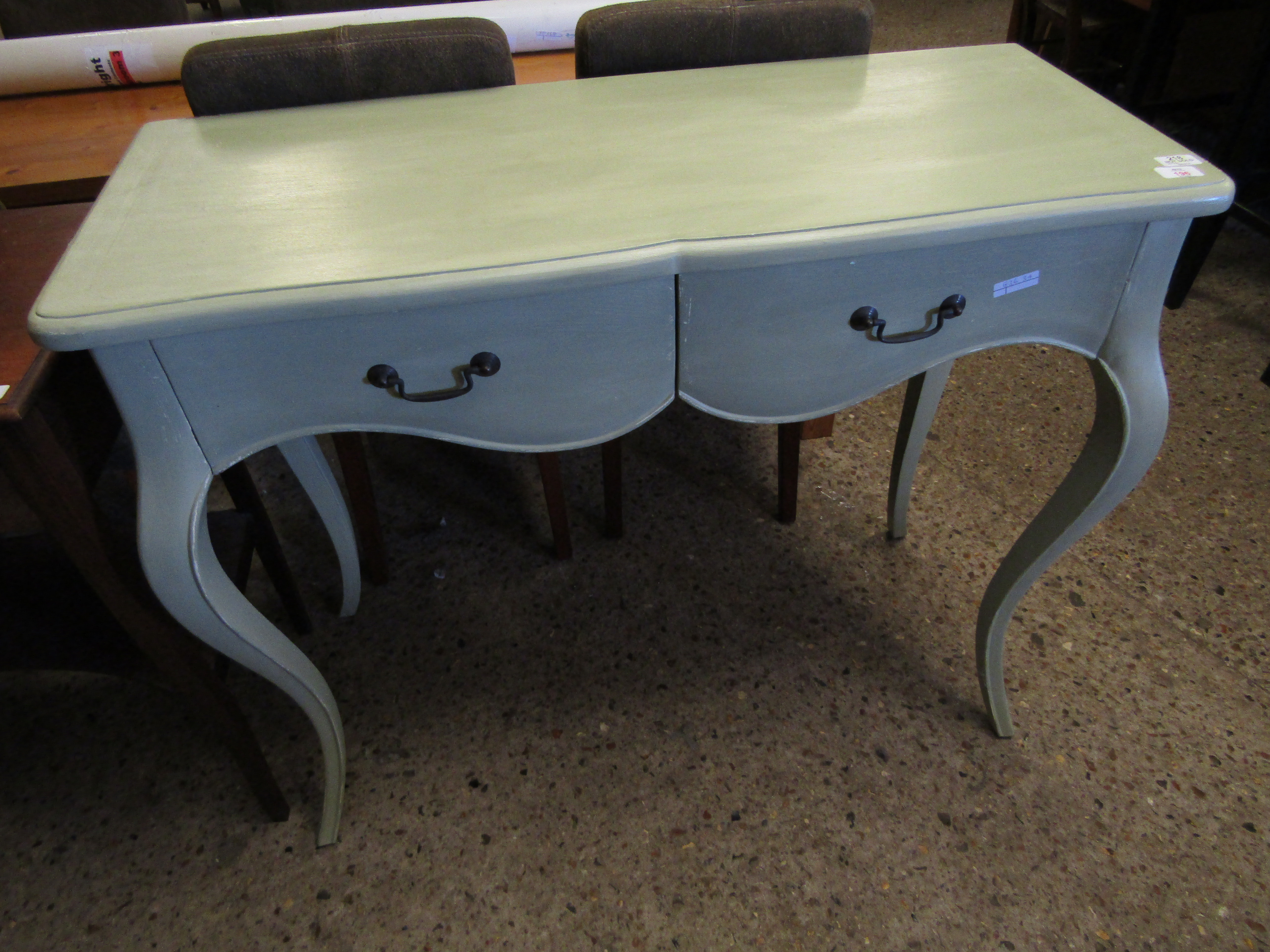 GREEN PAINTED TWO-DRAWER SIDE TABLE WITH SHAPED LEGS AND BRASS SWAN NECK HANDLES